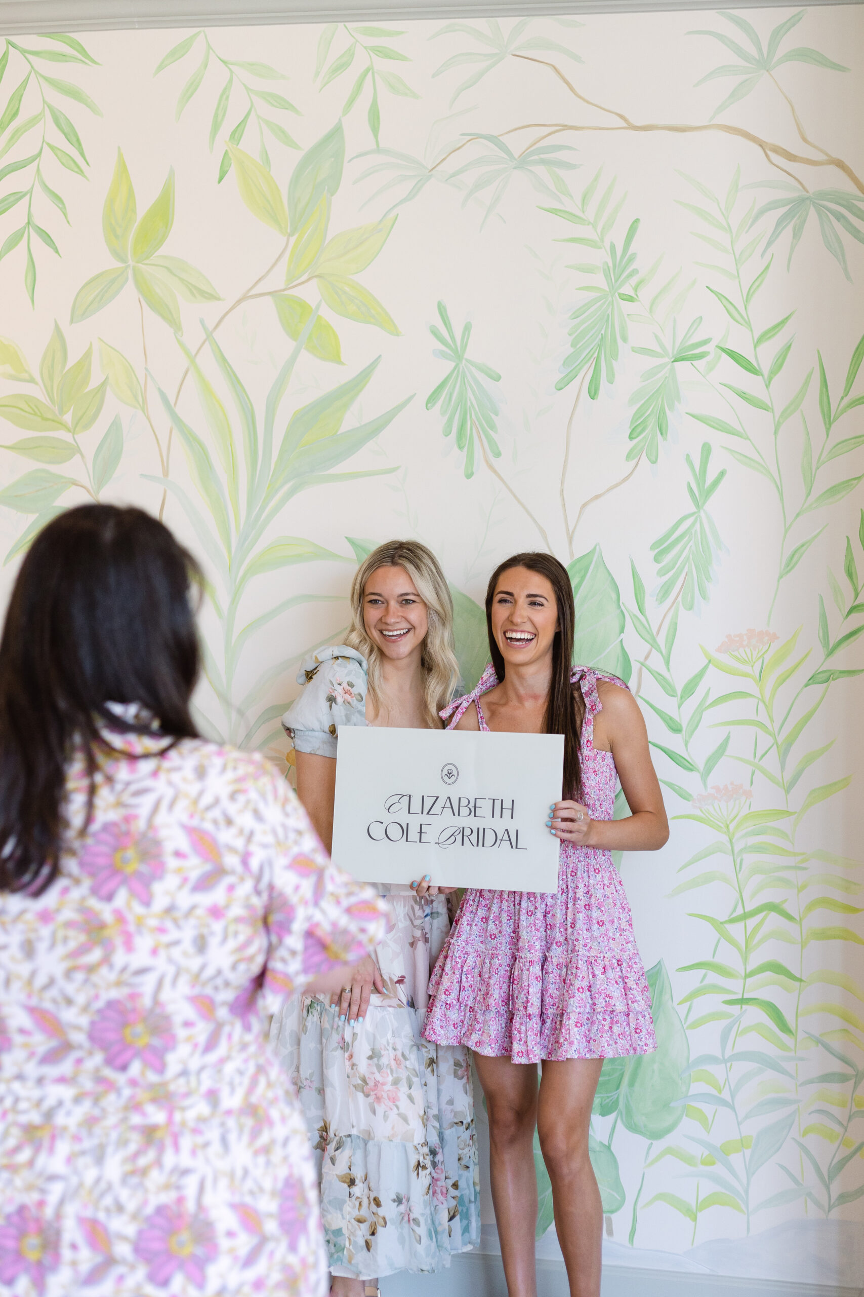 bride celebrating finding her wedding dress